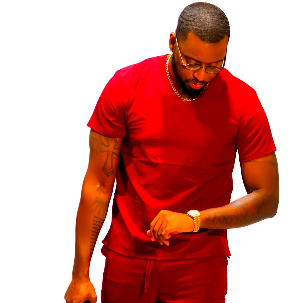 Unisex scrubs in vibrant colors. 2 X SM, 2 SM, 1 Medium, 3 LG, 1 2 XL. One set.